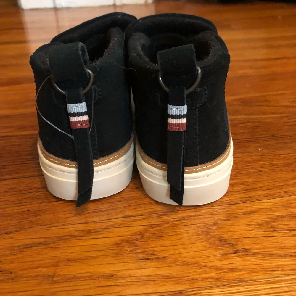 Tom’s Black suede slip on